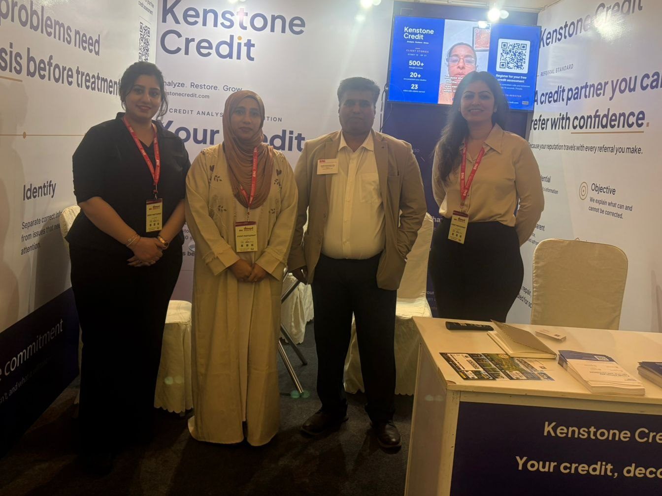 A BNI member with Harish Krishnamurthy, Akshatha Shetty, Sumayya Khanan and Rabia Basri at the Kenstone Credit stall